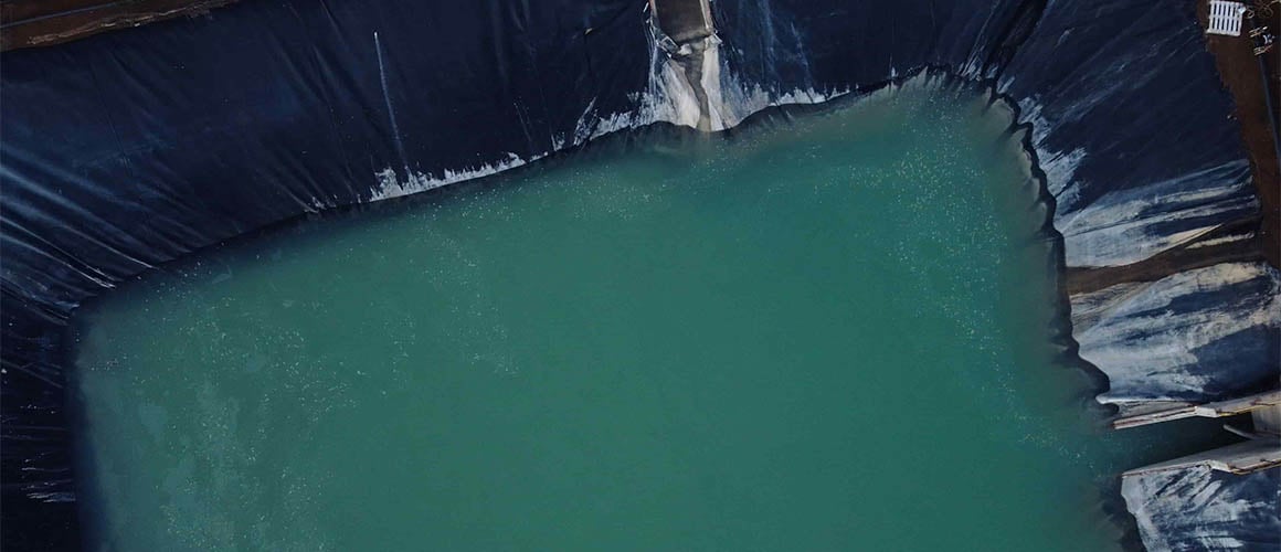 A tailings retreatment dam at the Elikhulu plant.